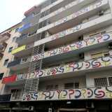 Al numero 144 di corso Sonnino i lunghi balconi di un anonimo palazzone di otto piani furono poi decorati da Picinni...